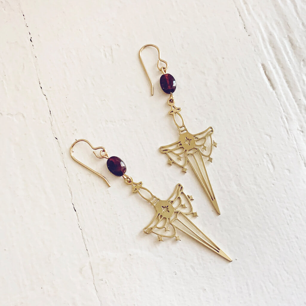 anelace // garnet and brass dagger earrings by Peacock and Lime