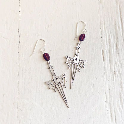 anelace // garnet and steel dagger earrings by Peacock and Lime