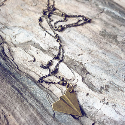 aviator - paper airplane pendant necklace - brass - Peacock & Lime
