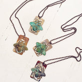 beeline // verdigris bee and soldered flame kissed copper dog tag pendant necklaces by Peacock & Lime