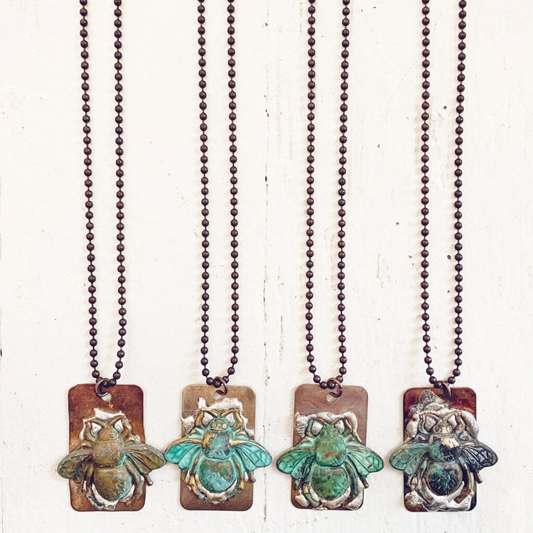 beeline // verdigris bee and soldered flame kissed copper dog tag pendant necklaces by Peacock & Lime