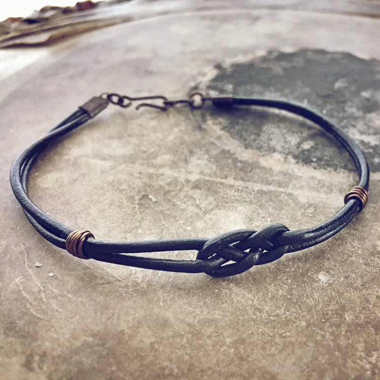 carrick bend // simple black leather knot friendship bracelet by Peacock & Lime