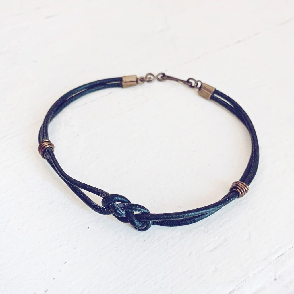 carrick bend // simple black leather knot friendship bracelet by Peacock & Lime