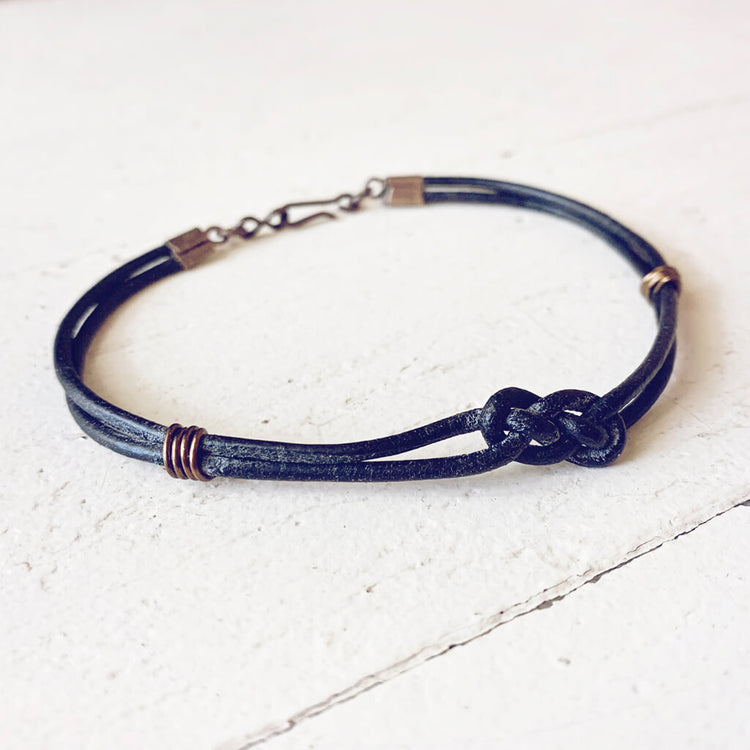 carrick bend // simple black leather knot friendship bracelet by Peacock & Lime