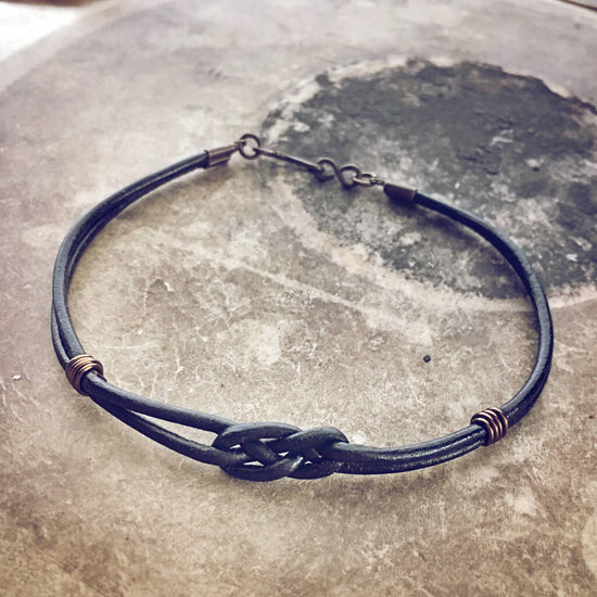 carrick bend // simple black leather knot friendship bracelet by Peacock & Lime