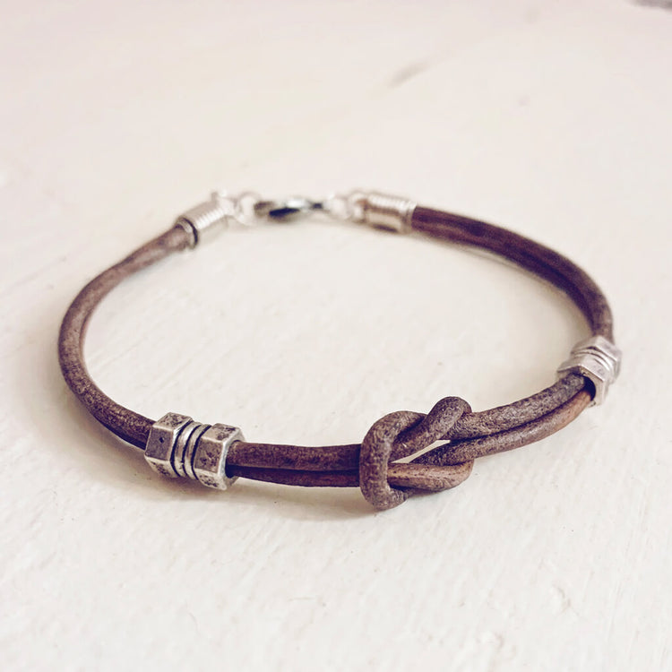 double hex // simple distressed grey brown leather knot bracelet with pewter hex beads by Peacock & Lime