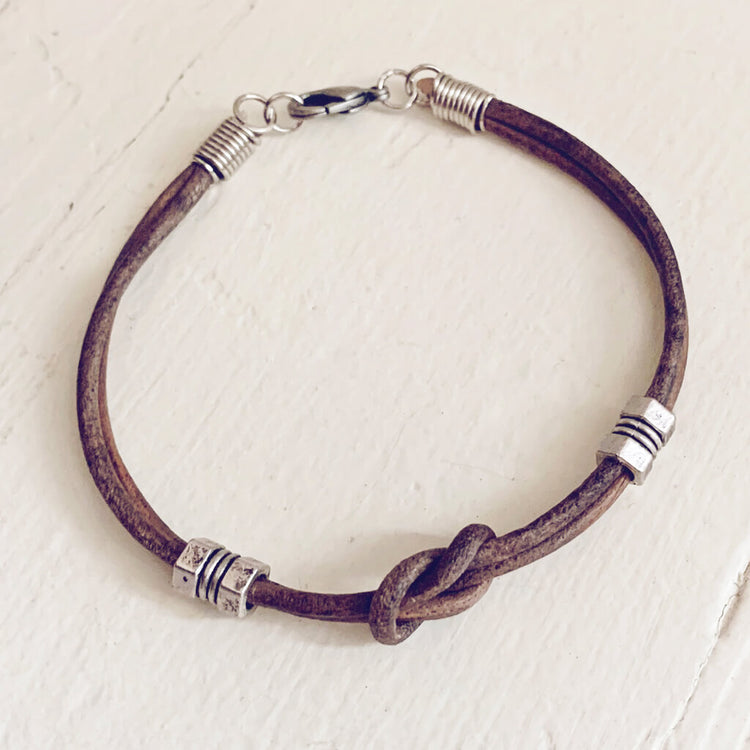 double hex // simple distressed grey brown leather knot bracelet with pewter hex beads by Peacock & Lime