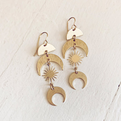 solar eclipse boho brass sun and moon dangle earrings by Peacock and Lime