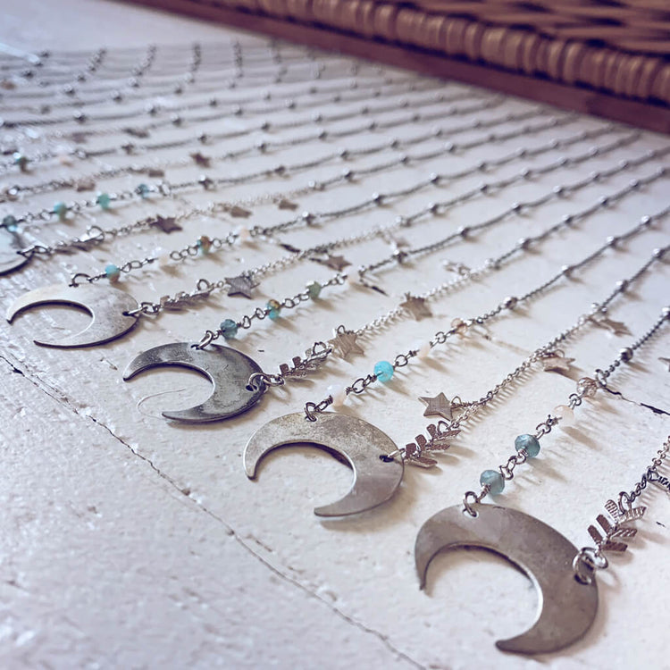 lunula // flame kissed silver boho crescent moon necklaces by Peacock & Lime