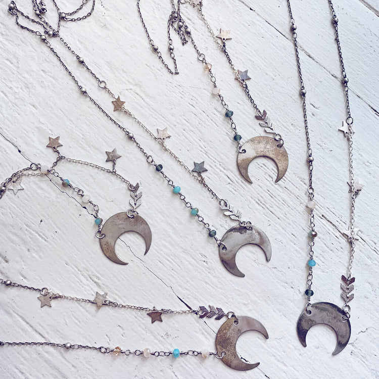 lunula // flame kissed silver boho crescent moon necklaces by Peacock & Lime