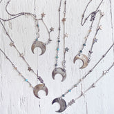 lunula // flame kissed silver boho crescent moon necklaces by Peacock & Lime