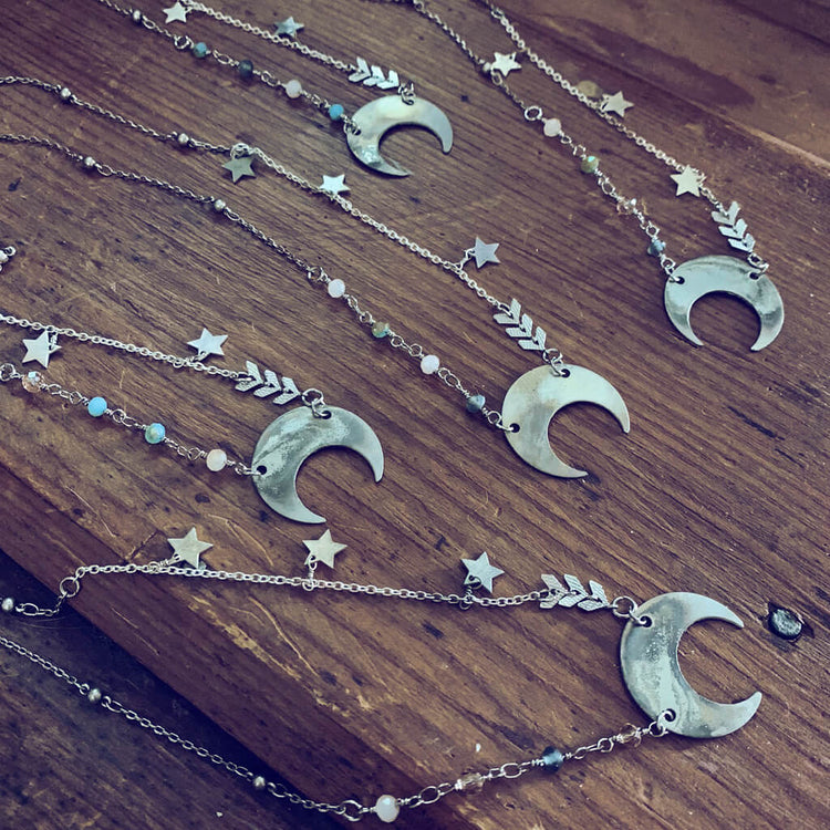 lunula // flame kissed silver boho crescent moon necklaces by Peacock & Lime