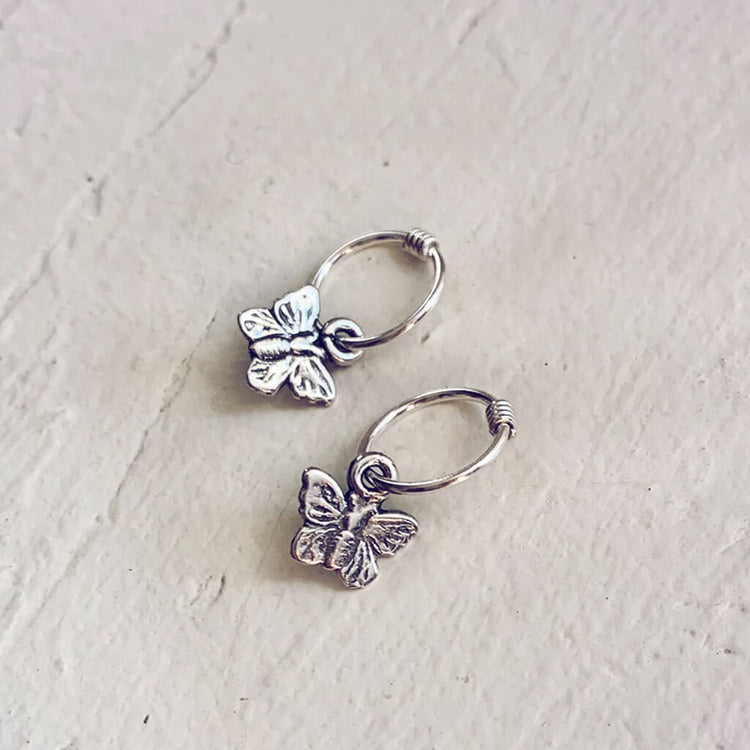 flutter // itty bitty sterling silver butterfly hoop sleeper earrings⁣ - Peacock & Lime