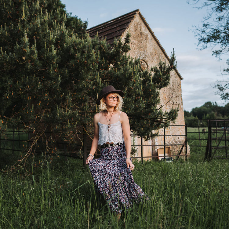 enchantment // copper electroformed crystal gemstone infused roller ball essential oil necklace worn on model with little gem necklace - by Peacock and Lime