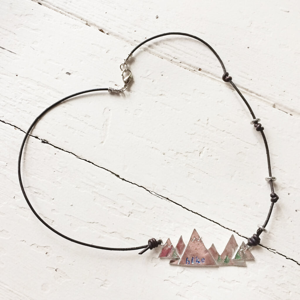 hike ii / hand stamped mountain pewter and leather pendant necklace by Peacock and Lime