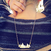 Hike / pewter mountain hand stamped pendant necklace worn on model by Peacock & Lime