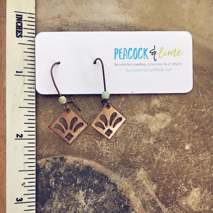 lily // dainty boho fleur de lis style drop earrings - Peacock & Lime