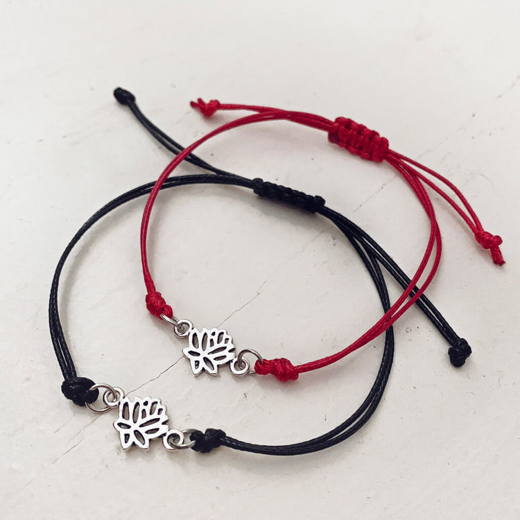 lucky lotus - small lotus flower charm adjustable waxed cord bracelets in red or black by Peacock & Lime