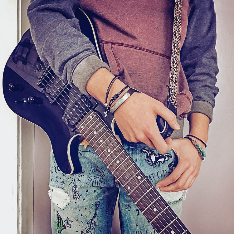 carrick bend // simple black leather knot friendship bracelet - worn on model - by Peacock & Lime