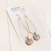 moon flower //long brass chevron earrings with moon & flower charm by Peacock & Lime