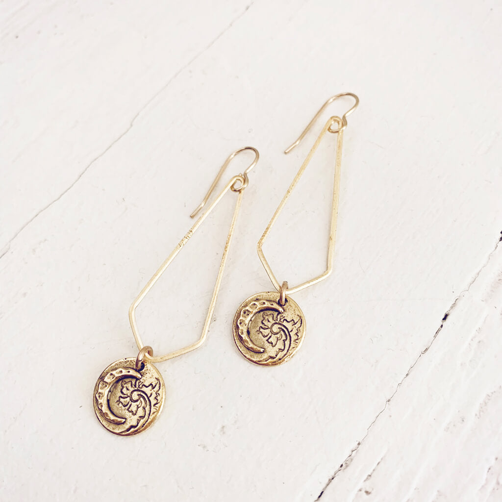 moon flower //long brass chevron earrings with moon & flower charm by Peacock & Lime