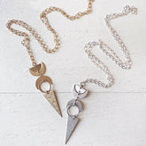moon phases // half moon, waxing, waning crescent moons, new moon and long triangle pendant necklaces by Peacock & Lime