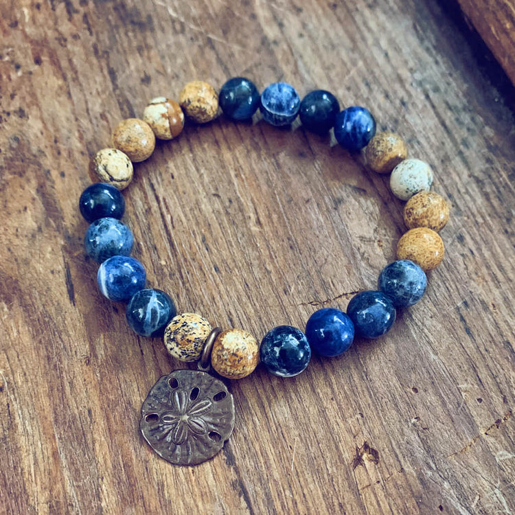 sand & sea // sodalite and picture jasper mala bead bracelet with sand dollar by Peacock & Lime