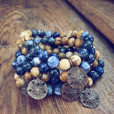 sand & sea // sodalite and picture jasper mala bead bracelets with sand dollar by Peacock & Lime