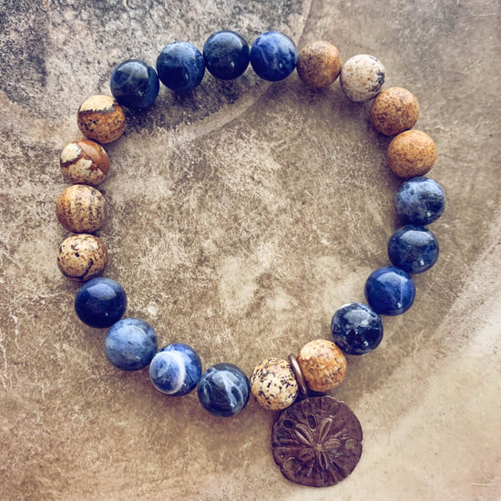 sand & sea // sodalite and picture jasper mala bead bracelet with sand dollar by Peacock & Lime