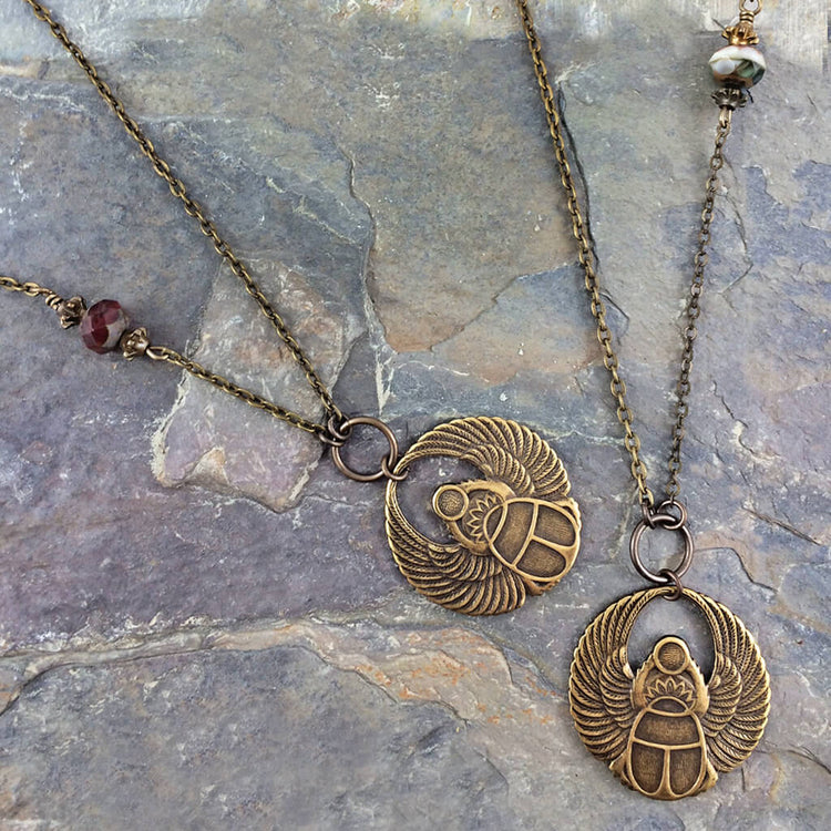 scarab // antiqued brass winged beetle amulet necklaces by Peacock and Lime