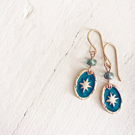stargazer // enamel and brass oval starburst earrings - brass - by Peacock and Lime