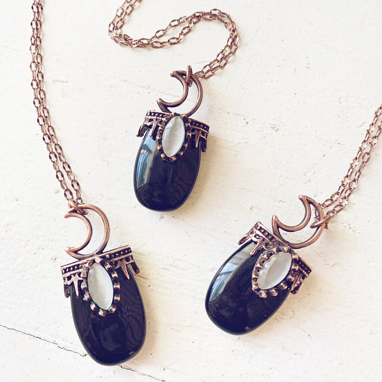 lux ex tenebris // copper electroformed black agate and crescent moon necklaces by Peacock and Lime