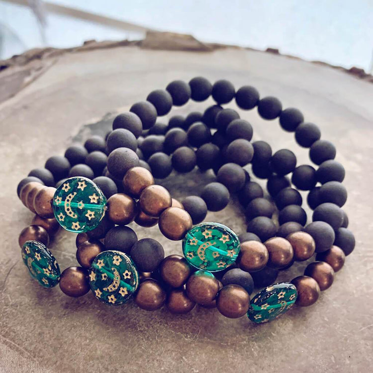 tranquility // black sandalwood and czech glass bracelet with emerald green moon & stars bead - Peacock & Lime , the original Peacock and Lime boho jewelry