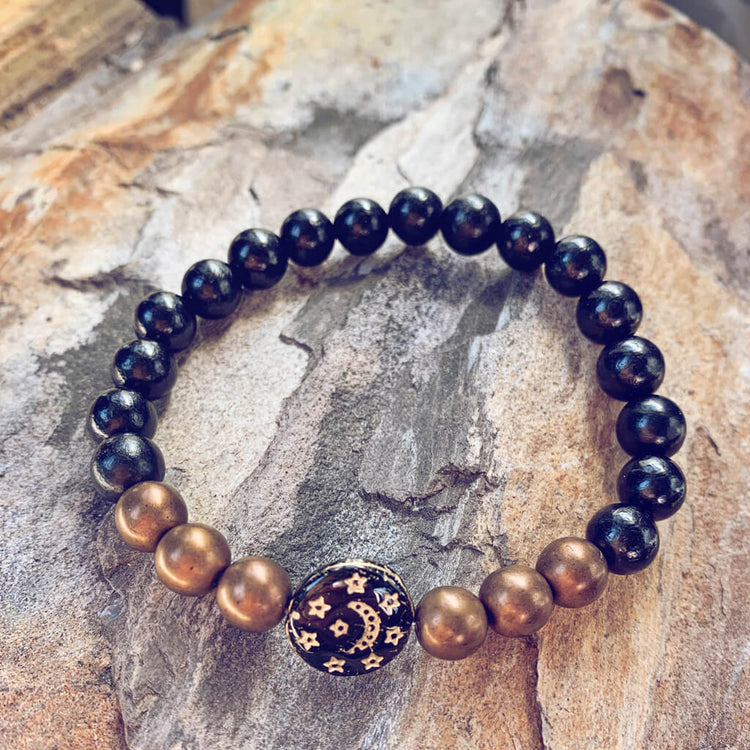 tranquility // black sandalwood and czech glass bracelet with black moon & stars bead - Peacock & Lime , the original Peacock and Lime boho jewelry