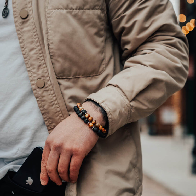 yin and yang // camel agate, lava rock and hematite bead bracelet set worn on model - Peacock & Lime